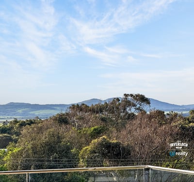 Breathtaking views of rolling hills and lush greenery create a captivating backdrop for your dream home.