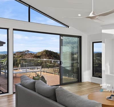 Bright open-plan living space with expansive views and seamless indoor-outdoor flow, perfect for modern living.