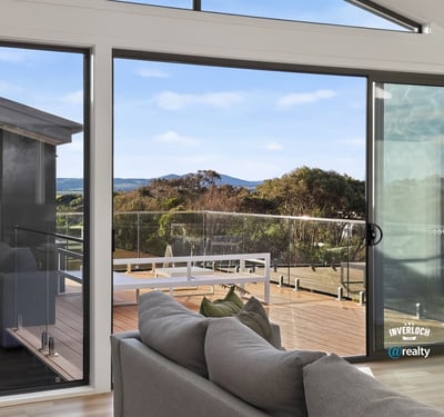 Spacious living area with expansive views, featuring large windows that invite abundant natural light.
