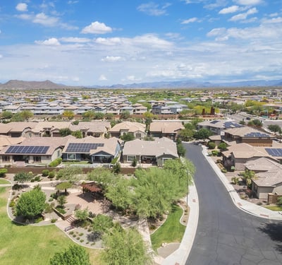 Elevated aerial perspective highlighting solar energy features, nearby park space, and a well-maintained Phoenix neighborhood. A smart blend of efficiency and outdoor surroundings.