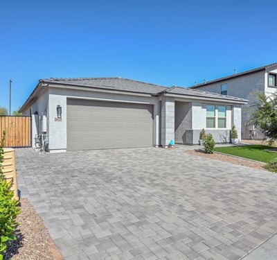 The wide RV gate and expansive paved parking area offer flexibility for extra vehicles, trailers, or your dream backyard addition.