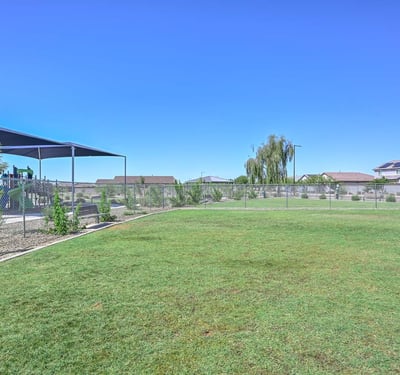 This grassy, fenced-in dog park is a major plus for pet lovers offering room to run and shaded benches nearby. Just steps from your new Peoria home in Rancho Cabrillo, it adds everyday convenience for your furry companions.