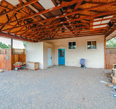 This oversized covered area provides ample room for vehicles, equipment, and storage. Durable construction supports practical day-to-day living across the home s acreage.