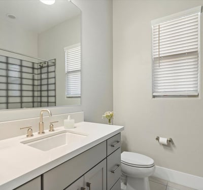 Modern guest bathroom offering sleek finishes, updated vanity, and a clean, contemporary design for everyday comfort.
