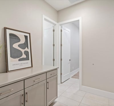 Entry drop zone with built-in storage and counter space, perfect for keys, bags, and everyday organization.