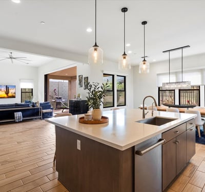Light-filled great room with expansive proportions, modern finishes, and seamless flow to adjacent living spaces. Designed for Scottsdale buyers who value openness and style.