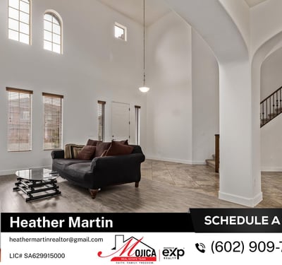 Vaulted ceilings and tall windows create a bright, welcoming great room. Updated flooring and an open floor plan enhance the spacious feel of this Glendale home designed for comfort and energy efficiency.