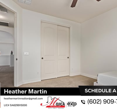 Featuring double-door closet access and ceiling fan, this bedroom offers practical comfort. A valuable addition to this Glendale property with pool and thoughtful interior design.