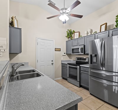 Well-designed kitchen with ample cabinetry, clean finishes, and natural light. Perfect for daily use and entertaining.