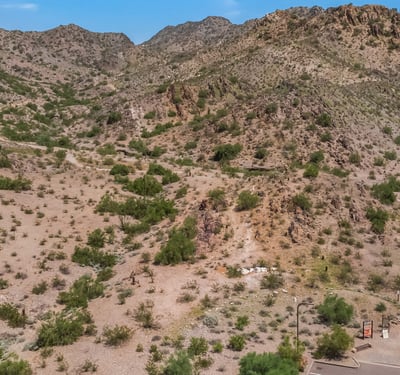 Aerial image of scenic desert trails and rugged terrain, showcasing outdoor recreation options close to this Phoenix property.