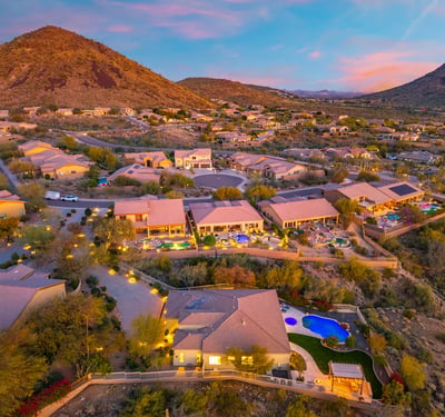 Scottsdale aerial capturing the hillside location, private pool, and landscaped backyard with surrounding desert terrain.