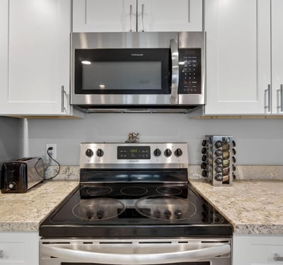 Stylish kitchen with stainless appliances, upgraded counters, and clean cabinetry, offering a move-in-ready cooking space.