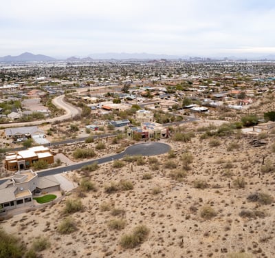 Unforgettable panoramic views overlook the Phoenix valley from this rare hillside lot near South Mountain Preserve. Experience vibrant sunsets, sparkling city lights, and endless desert beauty from every angle.