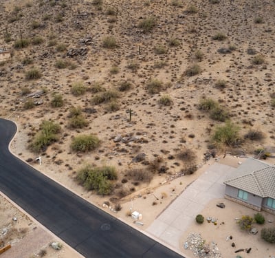 Quiet cul-de-sac homesite positioned against scenic desert mountains in Phoenix. This elevated lot offers privacy, natural beauty, and excellent potential for a luxury custom home retreat.