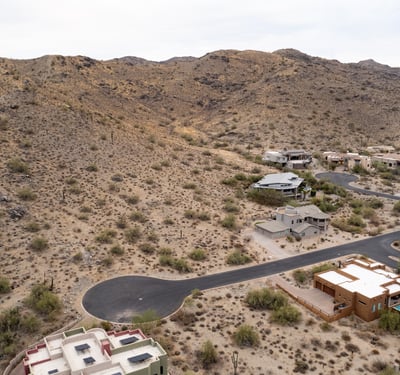 Sweeping aerial views capture the beauty of the Phoenix valley from this elevated desert homesite. Surrounded by mountain scenery and luxury properties, this lot offers exceptional custom build possibilities.