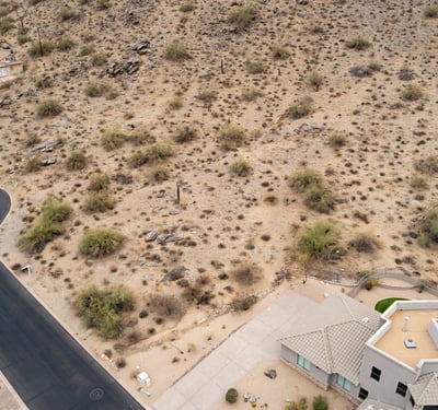 Stunning hillside lot located within the natural desert landscape of Phoenix. Surrounded by mountain scenery and luxury custom homes, this elevated property offers privacy and exceptional build possibilities.