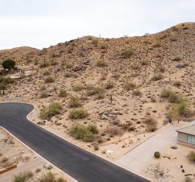Peaceful cul-de-sac setting surrounded by rugged desert mountains and upscale custom homes. This premium Phoenix homesite offers elevated terrain, scenic views, and a tranquil desert lifestyle.