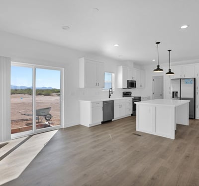 Open-concept living area designed for modern lifestyles with abundant natural light, durable flooring, and direct access to outdoor spaces. The spacious layout creates an inviting atmosphere for entertaining and daily living.