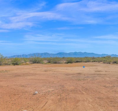 Picturesque mountain vistas stretch across the horizon, creating a beautiful backdrop for this Wittmann property. The expansive lot allows homeowners to enjoy the tranquility and openness of desert living.