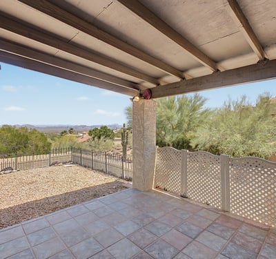 Take in beautiful desert and mountain vistas from this covered patio retreat. The spacious outdoor area is perfect for entertaining, outdoor dining, or simply enjoying the peaceful Fountain Hills setting.
