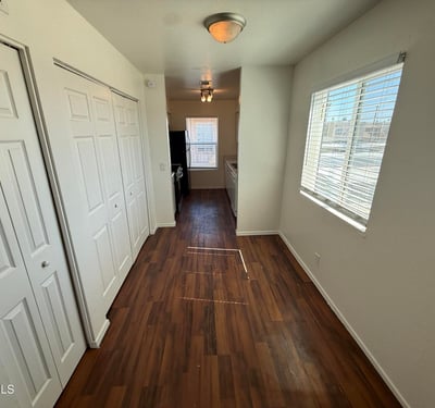 Bright dining space accented by large windows and attractive flooring. Conveniently positioned between the living area and kitchen, it creates an ideal flow for daily living and entertaining.