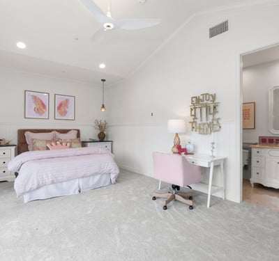 Bedroom 4-Spacious bedroom with soft carpeting, modern fixtures, and a dedicated workspace offering delightful natural light.