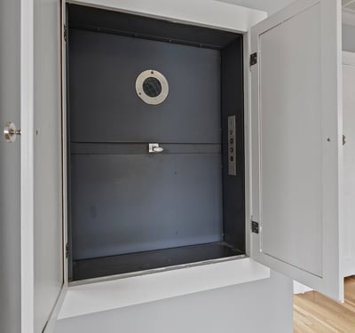 This unique built-in storage space offers convenient organization for your home essentials.