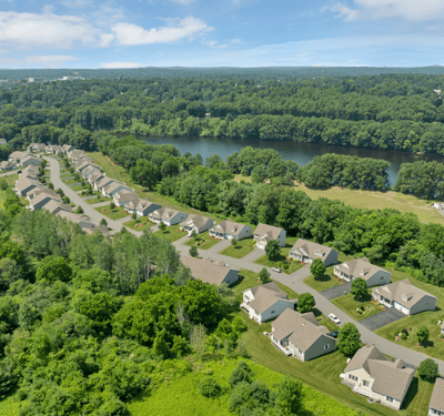 Spacious homes nestled near scenic river views, offering convenient access to nature and local amenities.