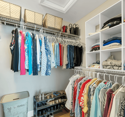Spacious and organized closet featuring ample shelving and hanging options for efficient storage and easy access.