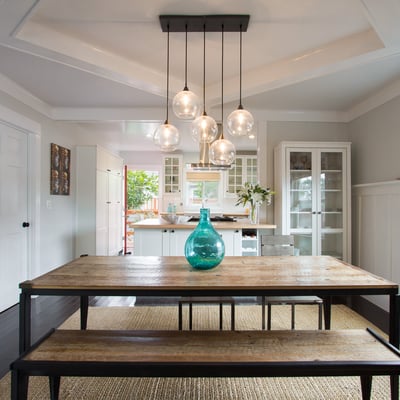 Open and spacious living and dining area. Original craftsman ceilings.