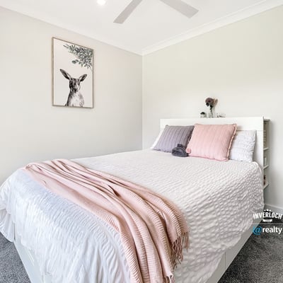 Bright and inviting bedroom featuring modern decor, soft textiles, and a peaceful atmosphere for relaxation.