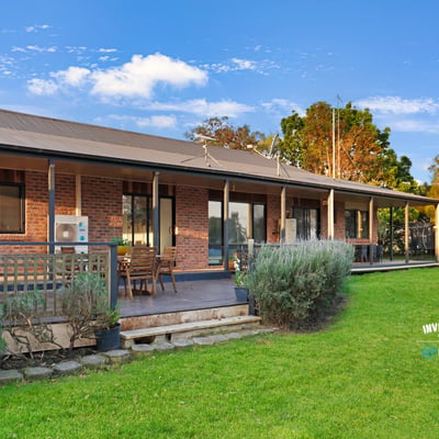 Spacious outdoor area complements this inviting home, perfect for entertaining and enjoying nature’s beauty.