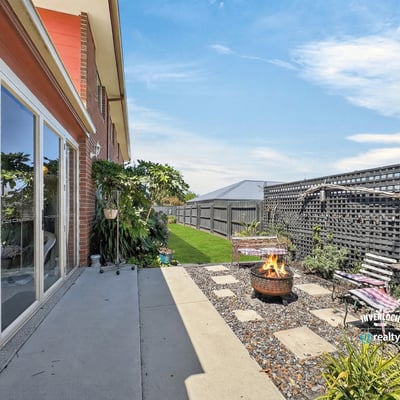 Discover a cozy outdoor space featuring a fire pit, ideal for gatherings and relaxation.