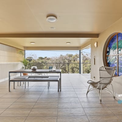 Spacious outdoor patio with scenic views, perfect for entertaining or relaxing in a tranquil atmosphere.