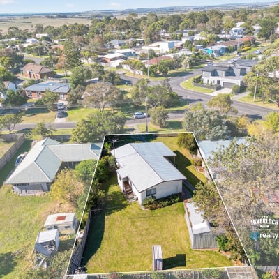 This spacious property features a large yard in a desirable neighborhood, perfect for future development or renovation.