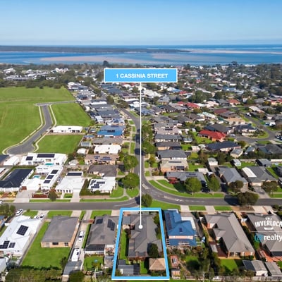 Expansive coastal lot in a developing neighborhood, offering stunning water views and convenient access to local amenities.