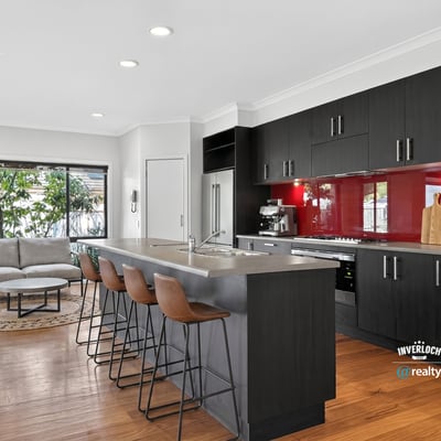 Contemporary kitchen featuring sleek cabinetry, a spacious island, and an open layout perfect for entertaining.