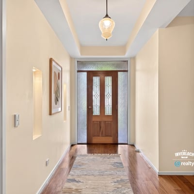 Inviting foyer with natural light, showcasing a welcoming entry that leads to the main living spaces.