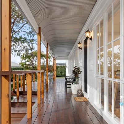 Discover this inviting porch offering a perfect blend of outdoor relaxation and easy access to the home.
