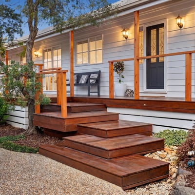 Discover outdoor living with a welcoming entryway, perfect for entertaining or enjoying peaceful moments.