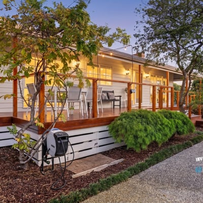 Discover this inviting home featuring a spacious deck, landscaped gardens, and modern amenities throughout.