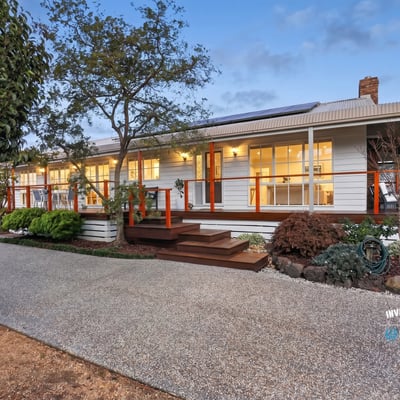 This inviting home features spacious outdoor areas and modern amenities, perfect for comfortable living and entertaining.