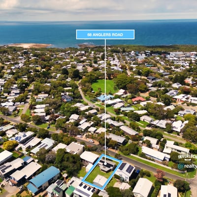 Discover coastal living with this prime location on Anglers Road, steps from beautiful beaches and community parks.