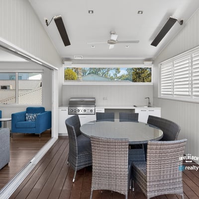 Bright and spacious outdoor entertaining area featuring modern amenities and a seamless indoor-outdoor flow.
