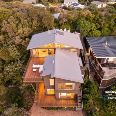 Discover this modern coastal retreat, featuring dynamic architecture and expansive outdoor living spaces surrounded by nature.