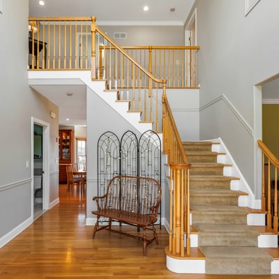 Welcoming and elegant two-story entrance foyer.