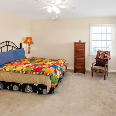 Roomy Bedroom 3 has a fan/light, double windows, and a large closet.