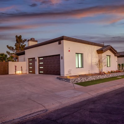 At sunset, this Scottsdale residence glows with upgraded exterior features, energy-efficient design, and a welcoming atmosphere.