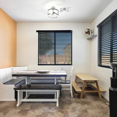 Dining area located just off the kitchen, offering a convenient and comfortable spot for meals and gatherings.