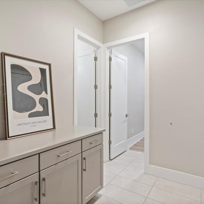 Entry drop zone with built-in storage and counter space, perfect for keys, bags, and everyday organization.